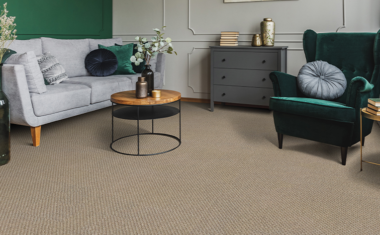 light colored carpet in a living room seating area
