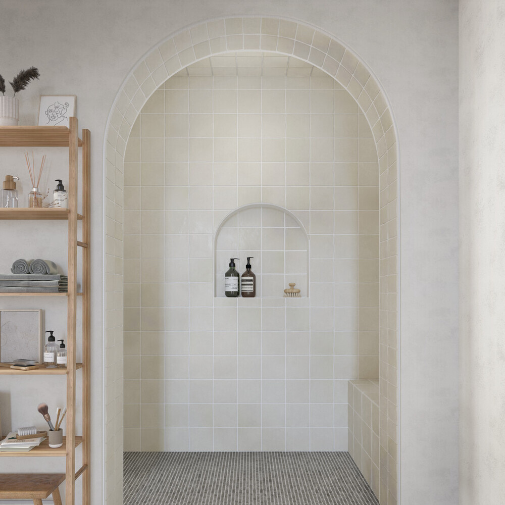 curved archway in neutral bathroom