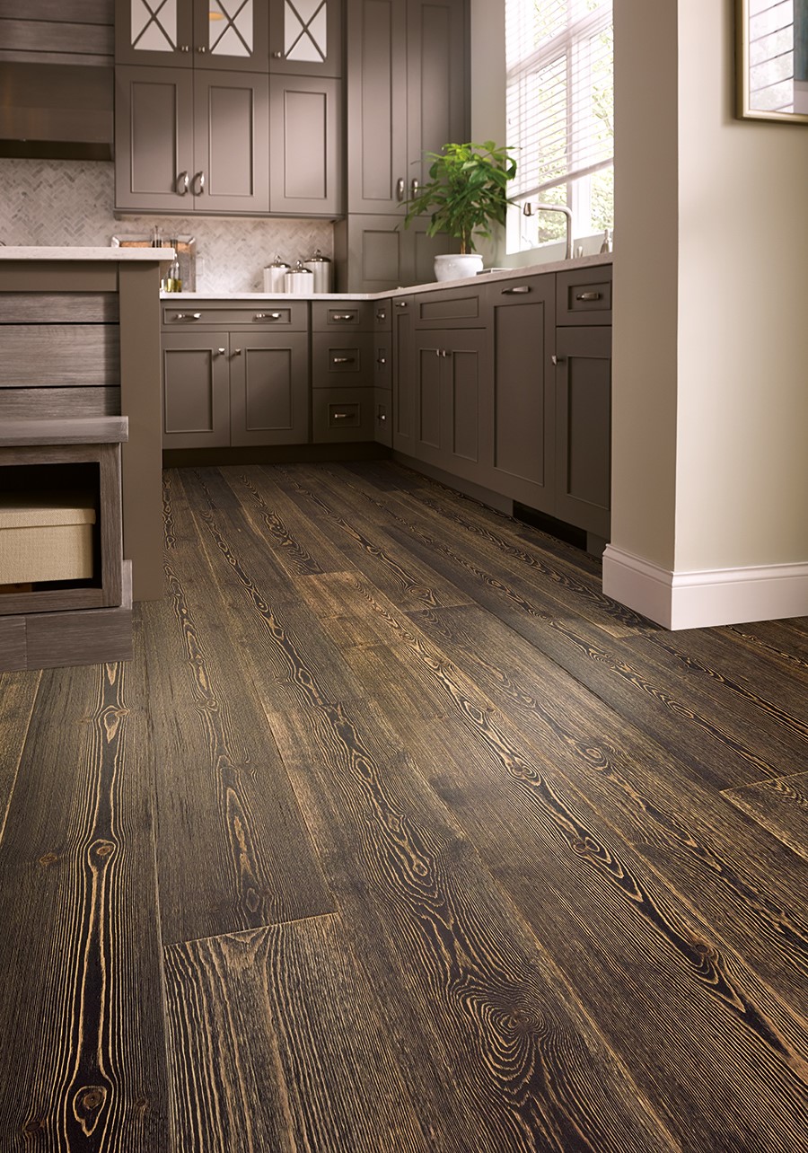 dark waterproof hardwood floor in dark colored kitchen