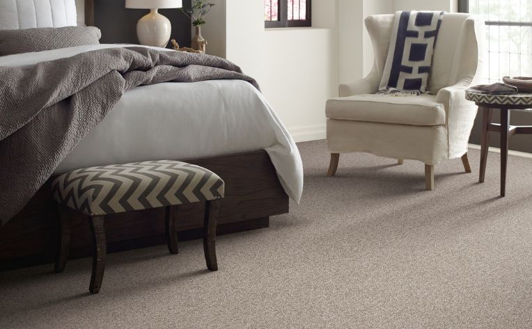 soft carpet in neutral toned bedroom