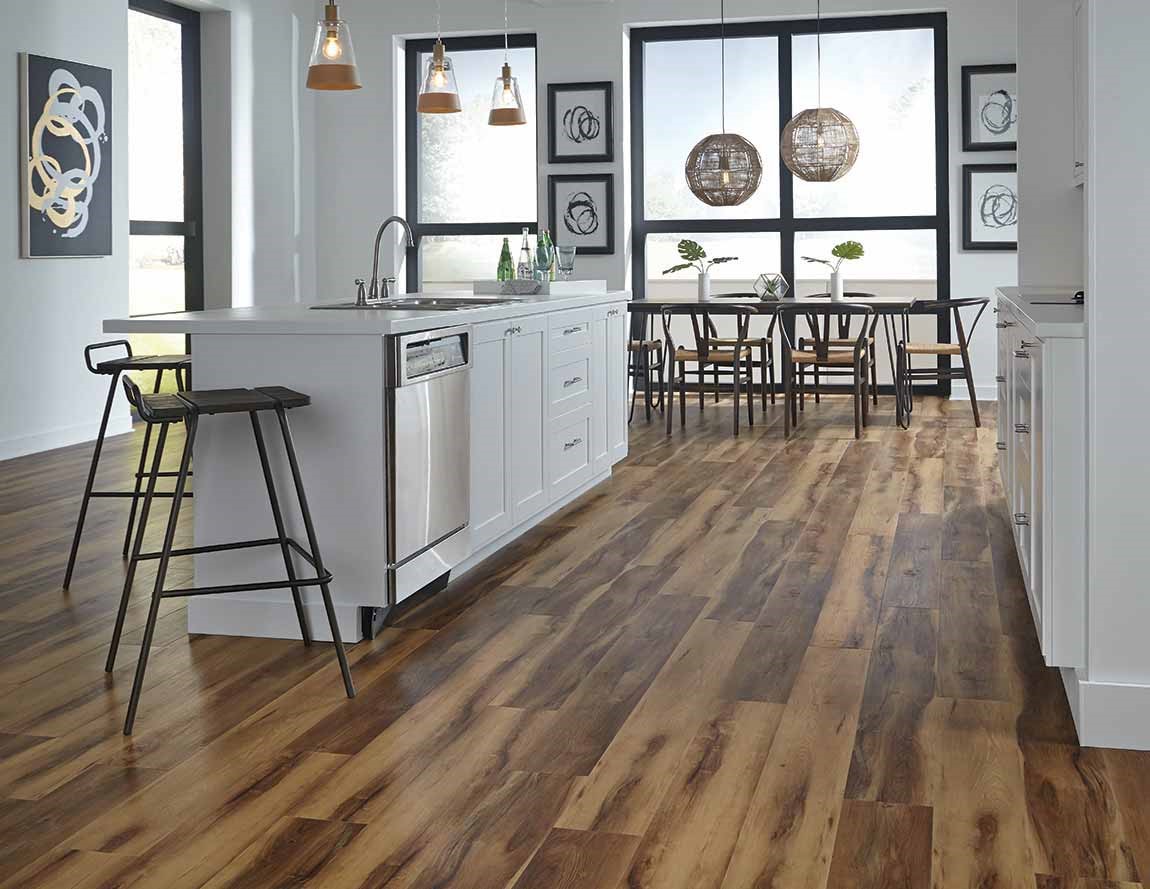 open kitchen with wood look tile flooring