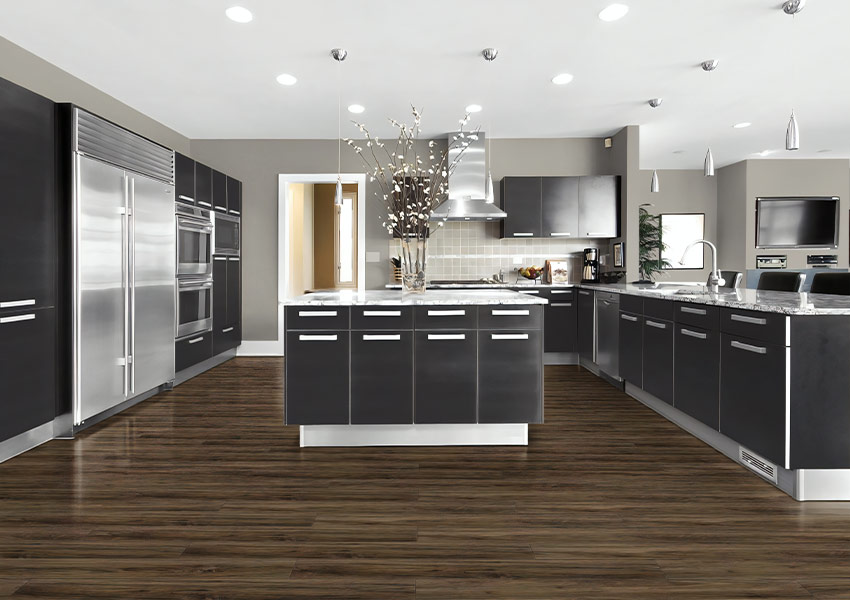dark toned luxury vinyl plank flooring in kitchen